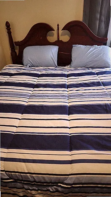 Full wooden king bed with an headboard, plus a 12" Sealy matress and boxes